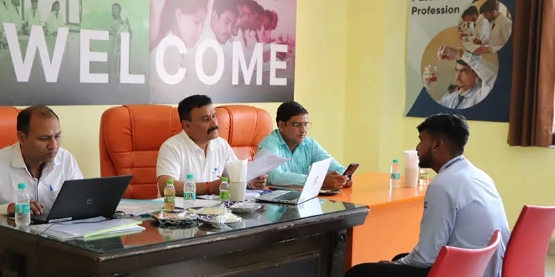 Two students looking at notes